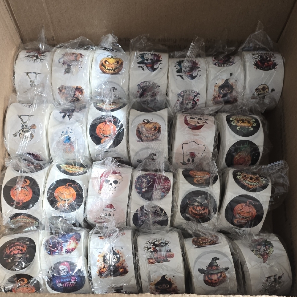 Case Of Halloween And Skeleton Themed Sticker Rolls